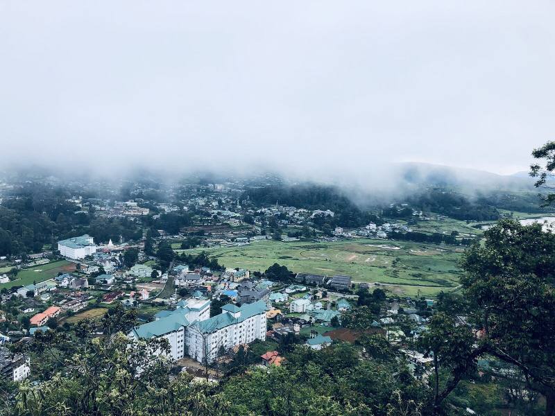 Mist rolling over the hills above Nuwara Eliya town, Sri Lanka