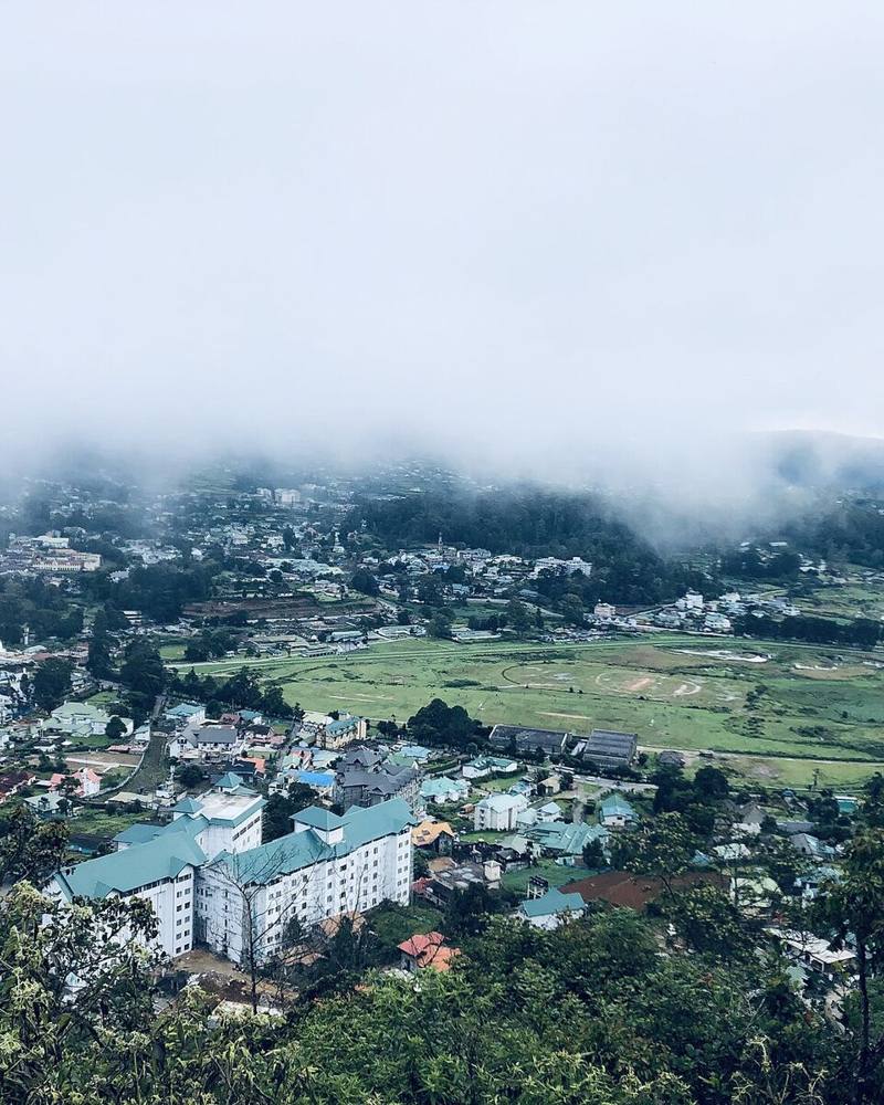 Mist rolling over the hills above Nuwara Eliya town, Sri Lanka